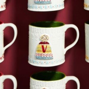 Anthropologie White and Green Mugs with Colorful Knit Design